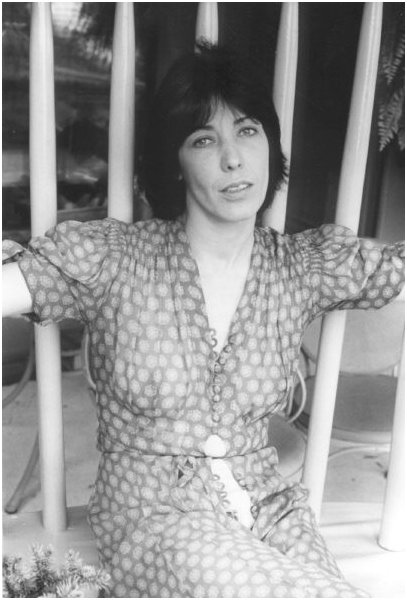 Lily Tomlin, in her Edith Ann chair